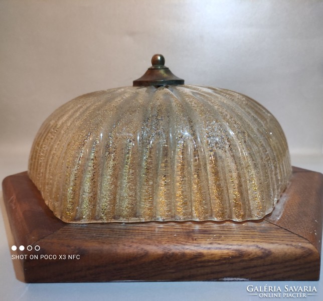 Glass ceiling lamp wall lamp on a wooden base with gold glittering shavings in the glass of the bura