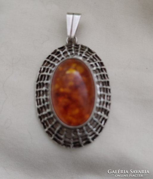 Silver pendant and ring with amber stones!