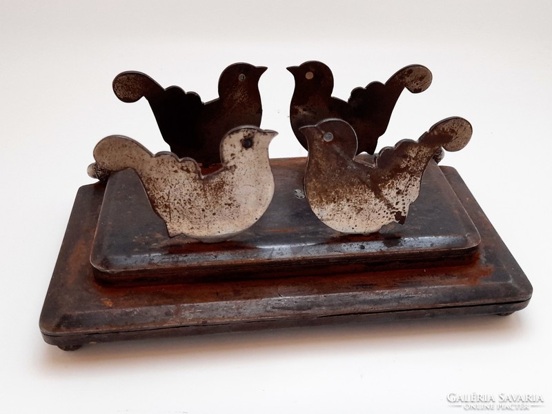 Bird-shaped, acorn cast iron holder, storage