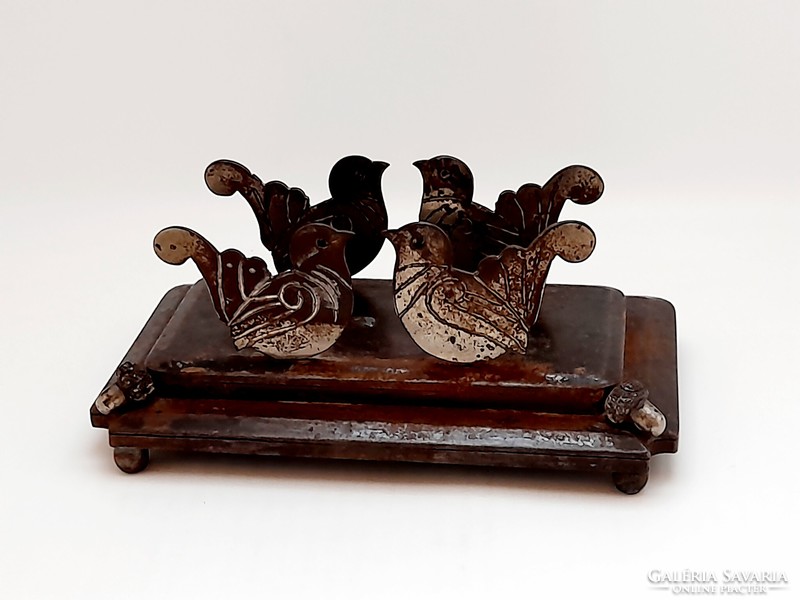 Bird-shaped, acorn cast iron holder, storage