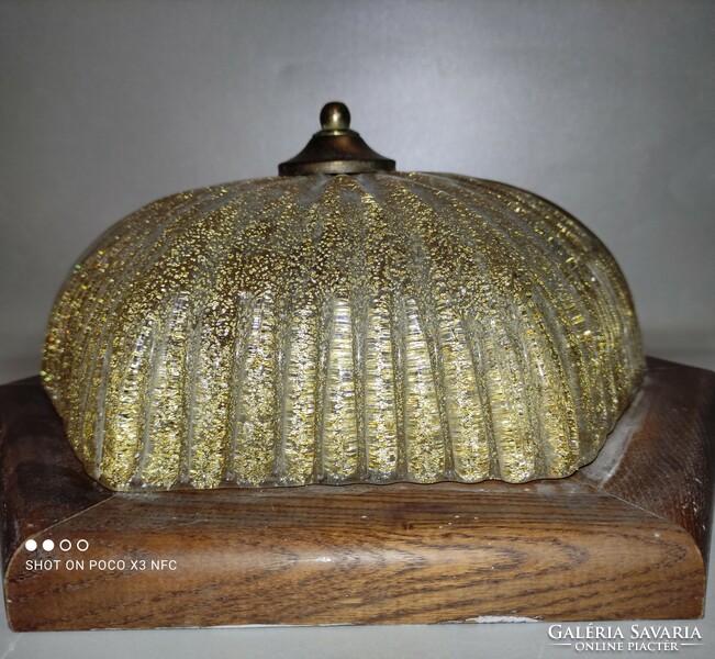 Glass ceiling lamp wall lamp on a wooden base with gold glittering shavings in the glass of the bura