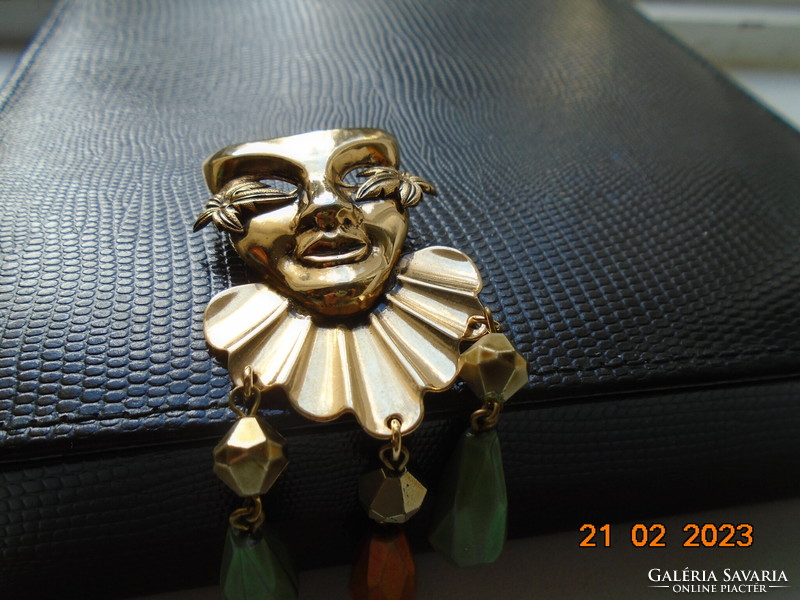 Art deco w.Germany gold-plated brooch with carnival mask, faceted colored stone and bronze beads