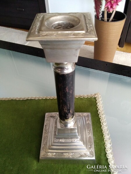 Candle holder in the shape of a Doric column, with a stepped engraved pattern and a silver-plated base.