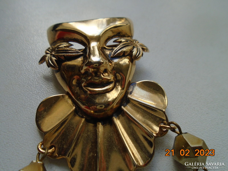 Art deco w.Germany gold-plated brooch with carnival mask, faceted colored stone and bronze beads
