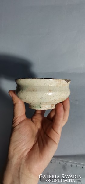 Antique bird in Middle Eastern bowl