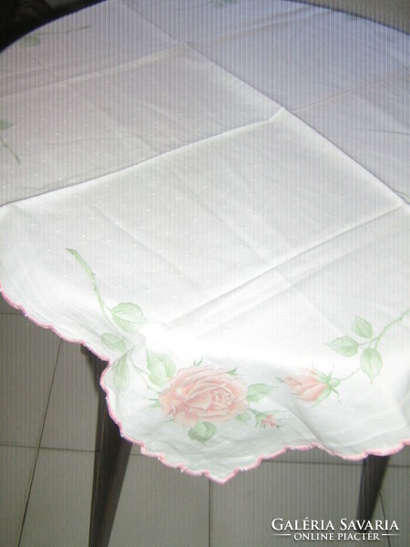 Beautiful vintage rose tablecloth with a slinged edge