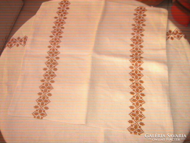 Beautiful antique hand-embroidered cross-stitch lace-edged woven tablecloth with decorative pillow