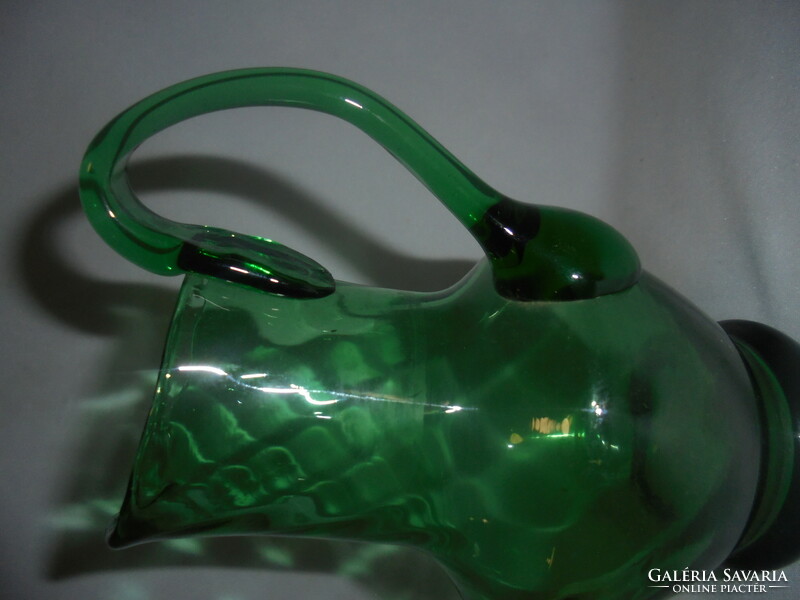 Old, smaller green glass jug