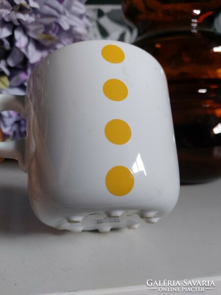 Ikea mug with yellow dots on small legs