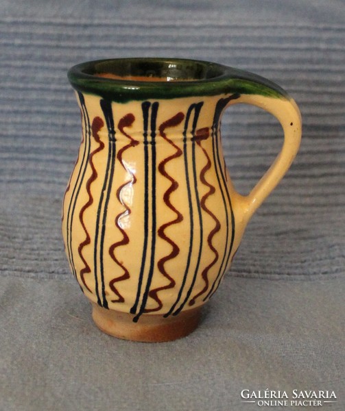 Small glazed ceramic jug