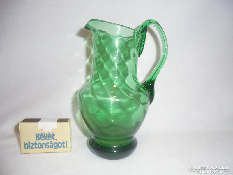 Old, smaller green glass jug