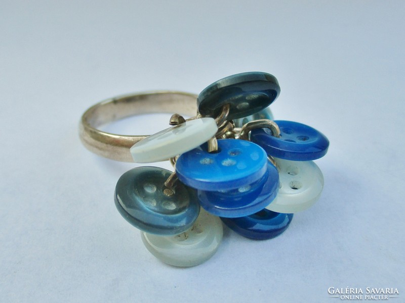Very extra silver ring with blue buttons