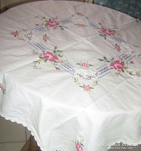 Beautiful crochet rose tablecloth embroidered with tiny cross stitches