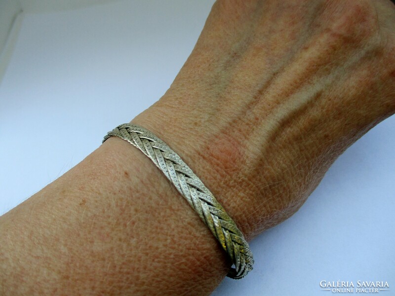 Wide silver bracelet with a nice pattern
