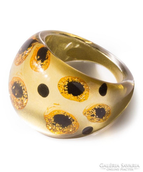 Gold-colored, black speckled 3D ring made of acrylic, very beautiful.