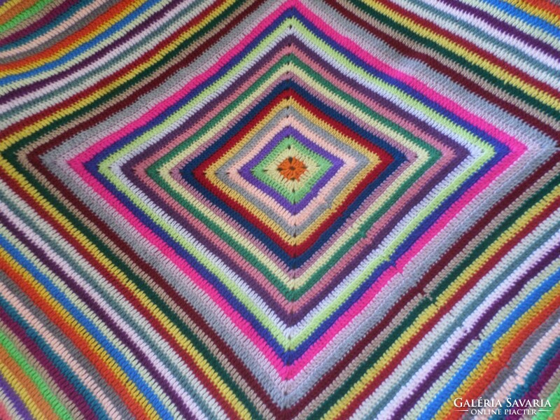 Cheerful colorful hand crocheted bedspread.