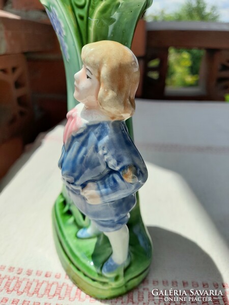 Art Nouveau majolica vase with a small figure