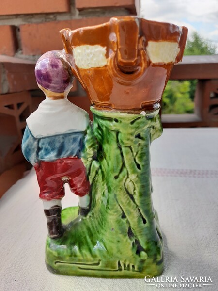 Art Nouveau majolica vase with a small figure