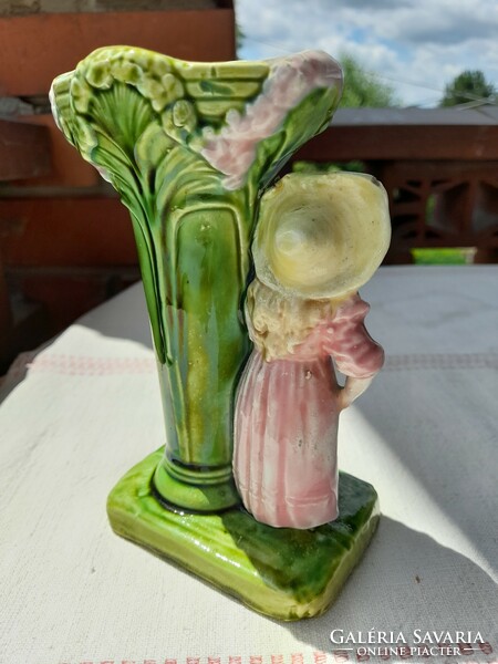 Art Nouveau majolica vase with a small figure