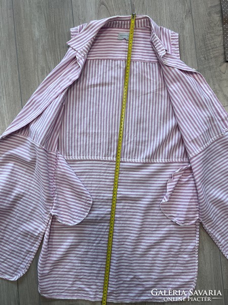 Reserved sleeveless long blouse