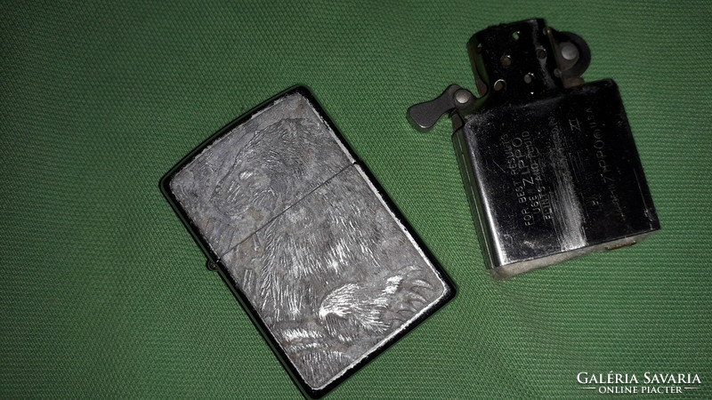 Old original zippo metal grizzly bear relief gasoline lighter as shown in the pictures