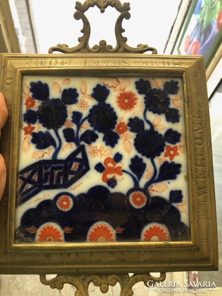Old fire enamel coaster with bronze frame, size 24 x 22 cm.