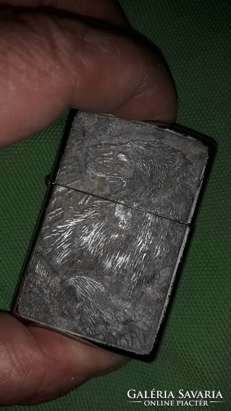 Old original zippo metal grizzly bear relief gasoline lighter as shown in the pictures