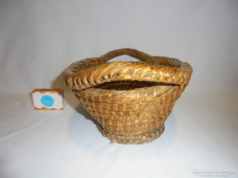 Old cane wicker basket, table offering, fruit basket