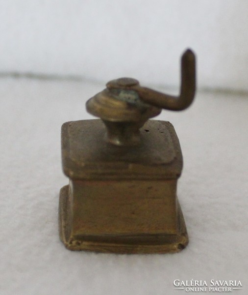 Miniature copper coffee grinder