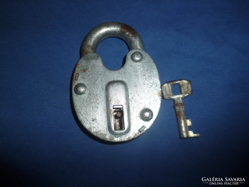 Old padlock with key