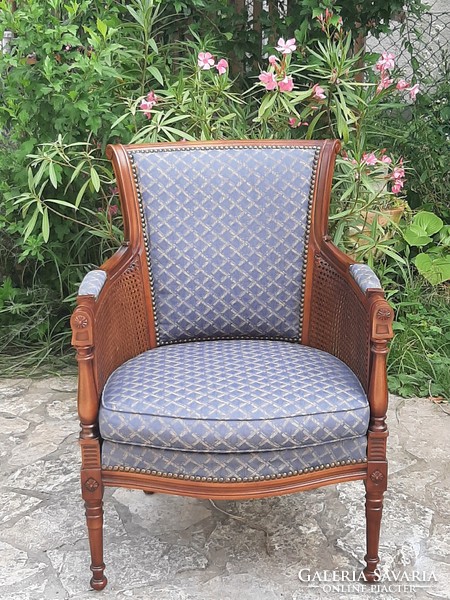 xvi. A rare double reeded elegant armchair in Louis style