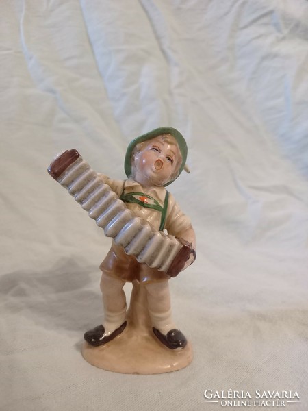 Bertram accordion boy figurine glued