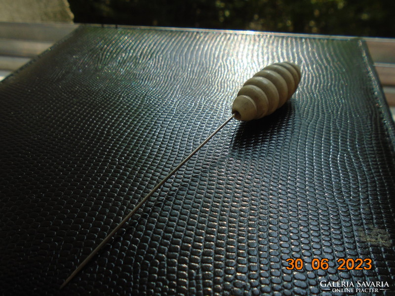Spectacular large vintage hat pin with a white beehive wooden bead