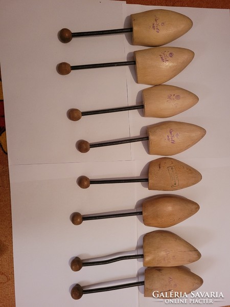 4 Pairs of spring-loaded wooden stilts in one