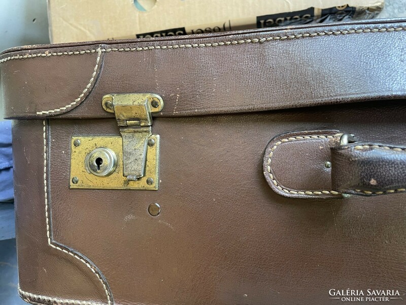 Old leather traveling suitcase, case, bag