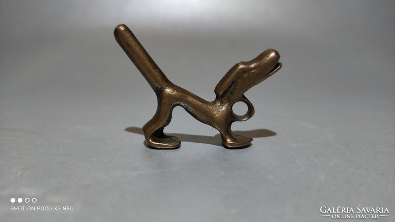 Now it's worth the price!!! A copper dachshund dog demolition pendant or key ring is a good successful gift