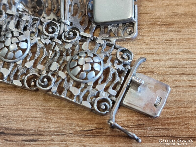 A particularly beautiful silver jewelry watch with rhodonite