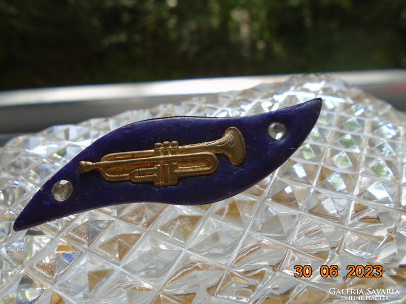 Fire-gilt copper antique brooch with embossed fire-gilt copper trumpet with indigo blue background