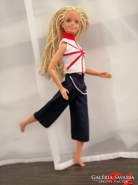 A barbie, a hasbro doll
