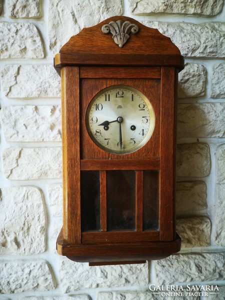 Beautiful antique wall clock in art deco style. Haller a. G.