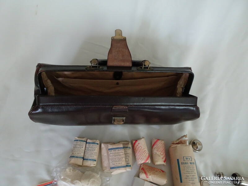 Old leather medical bag and tools.