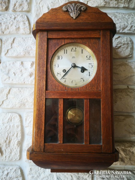 Beautiful antique wall clock in art deco style. Haller a. G.