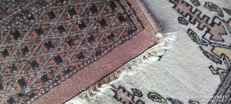 Hand-knotted Pakistani carpet is negotiable