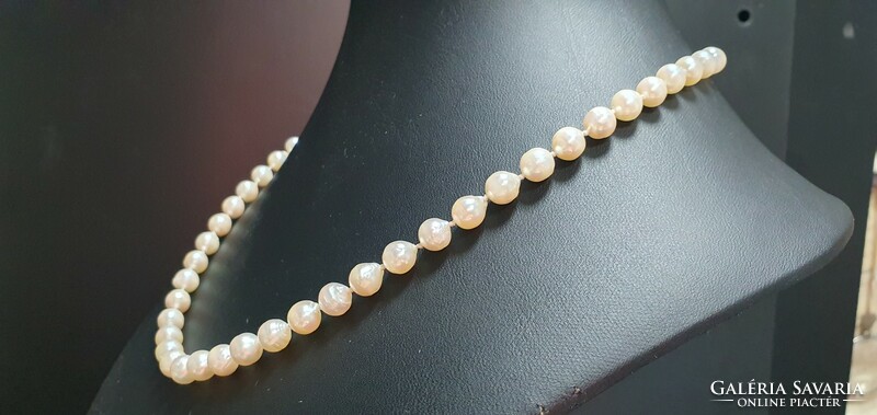 Antique baroque akoya pearl string.