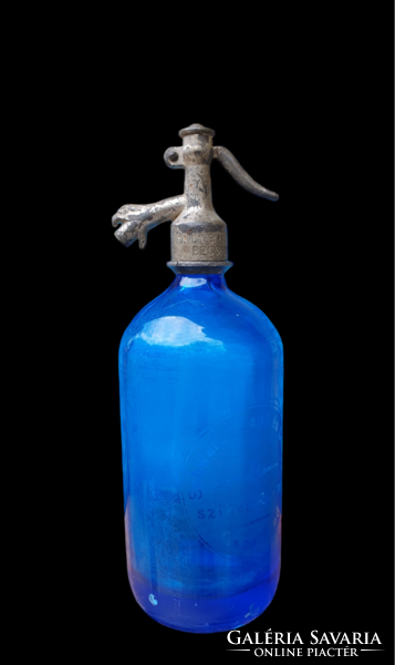 1931, blue soda bottle, with sandblasted inscription and pattern. Antique pewter head.