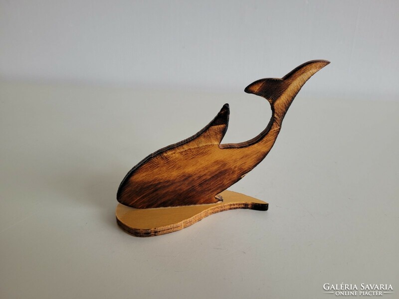An old souvenir from Balaton made of wooden fish with the inscription Boglárlelle