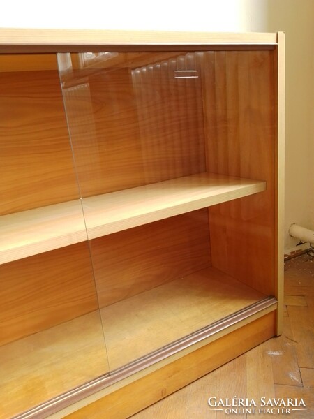 Closed bookshelf with sliding glass door, glass bookcase, low shelf storage, showcase