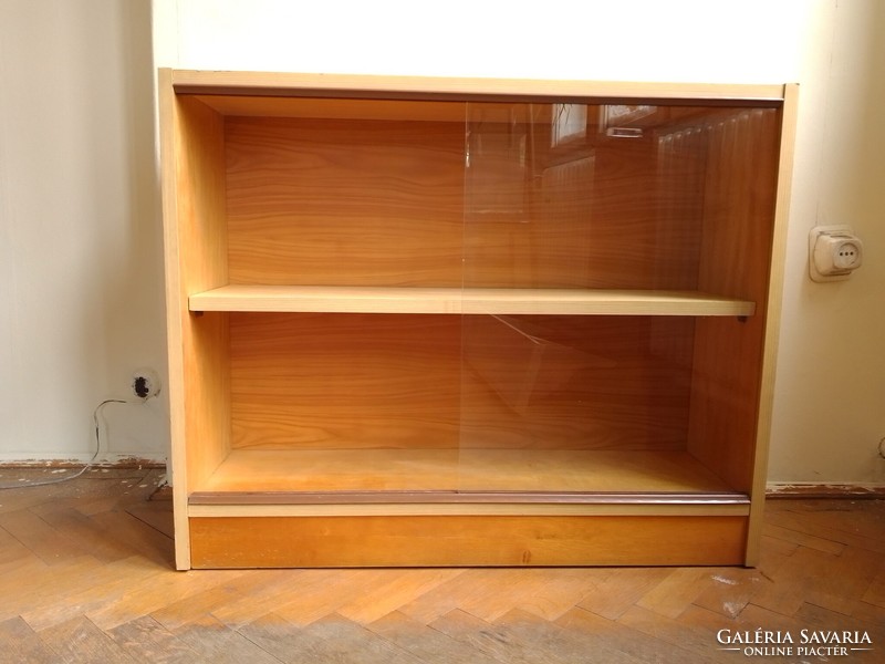 Closed bookshelf with sliding glass door, glass bookcase, low shelf storage, showcase