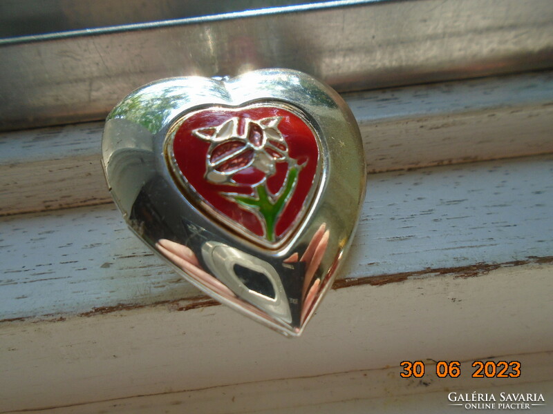 Silver-plated relic holding heart pendant with fire enamel flower