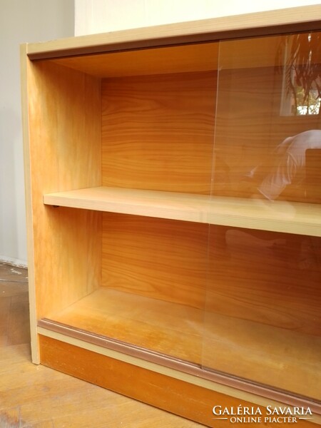 Closed bookshelf with sliding glass door, glass bookcase, low shelf storage, showcase